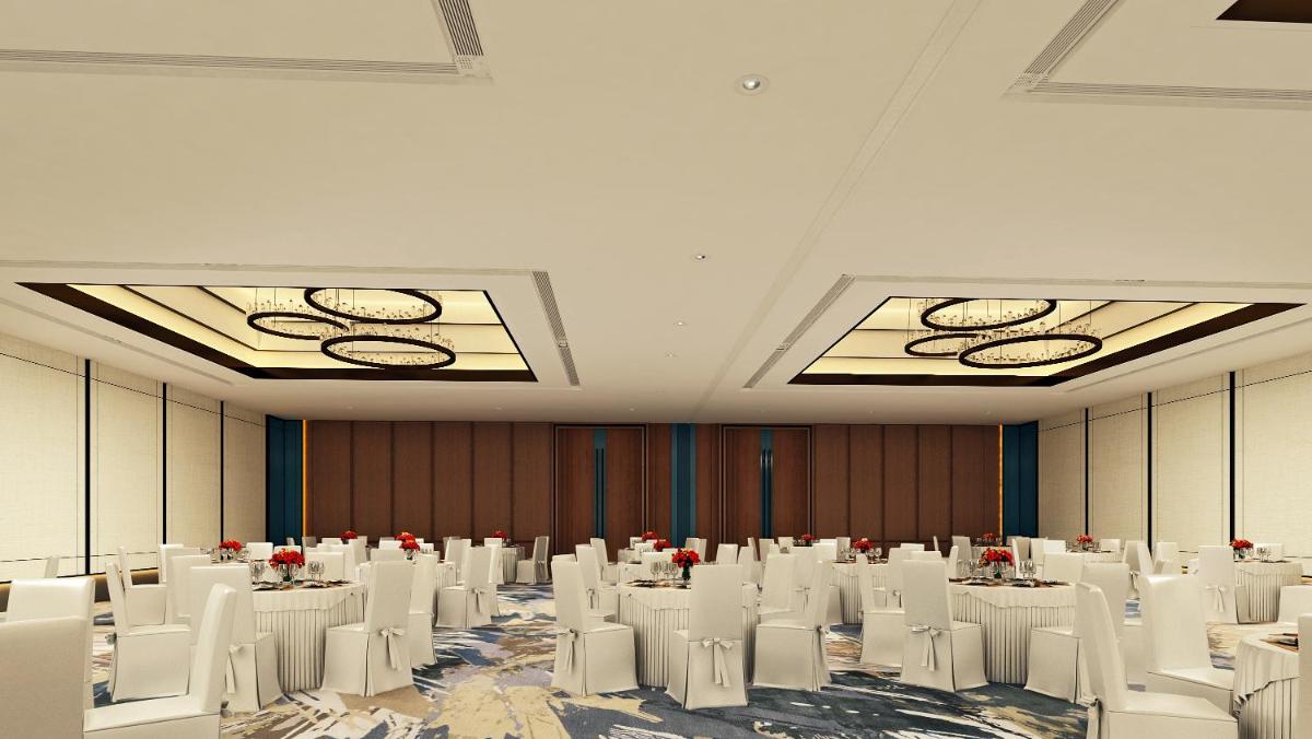 a conference room with white chairs and tables at Hyatt Centric Hebbal Bengaluru in Bengaluru