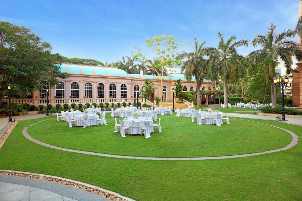 a wedding reception in the garden of a resort at ITC Maratha, a Luxury Collection Hotel, Mumbai in Mumbai