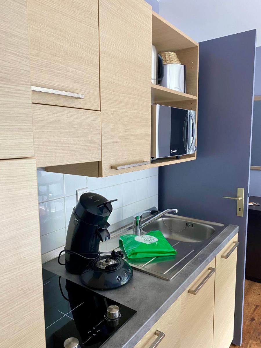 Cuisine ou kitchenette dans l'établissement Résidence Le Grand Tétras- SPA THERMAL INCLUS