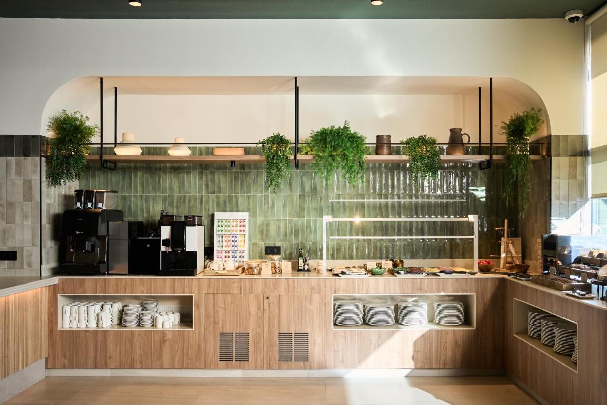 Una cocina o zona de cocina en Catalonia La Maquinista