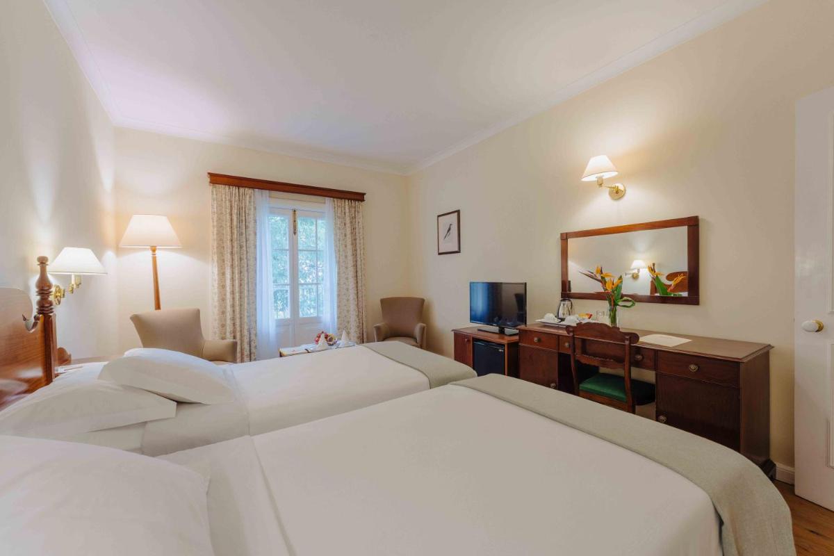 Uma cama ou camas num quarto em Quinta da Bela Vista