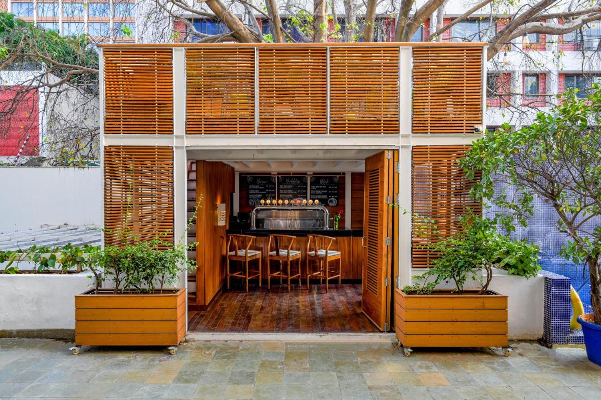 a building with a bar inside of it at The Park Bangalore, MG Road in Bengaluru a building with a bar inside of it at The Park Bangalore, MG Road in Bengaluru