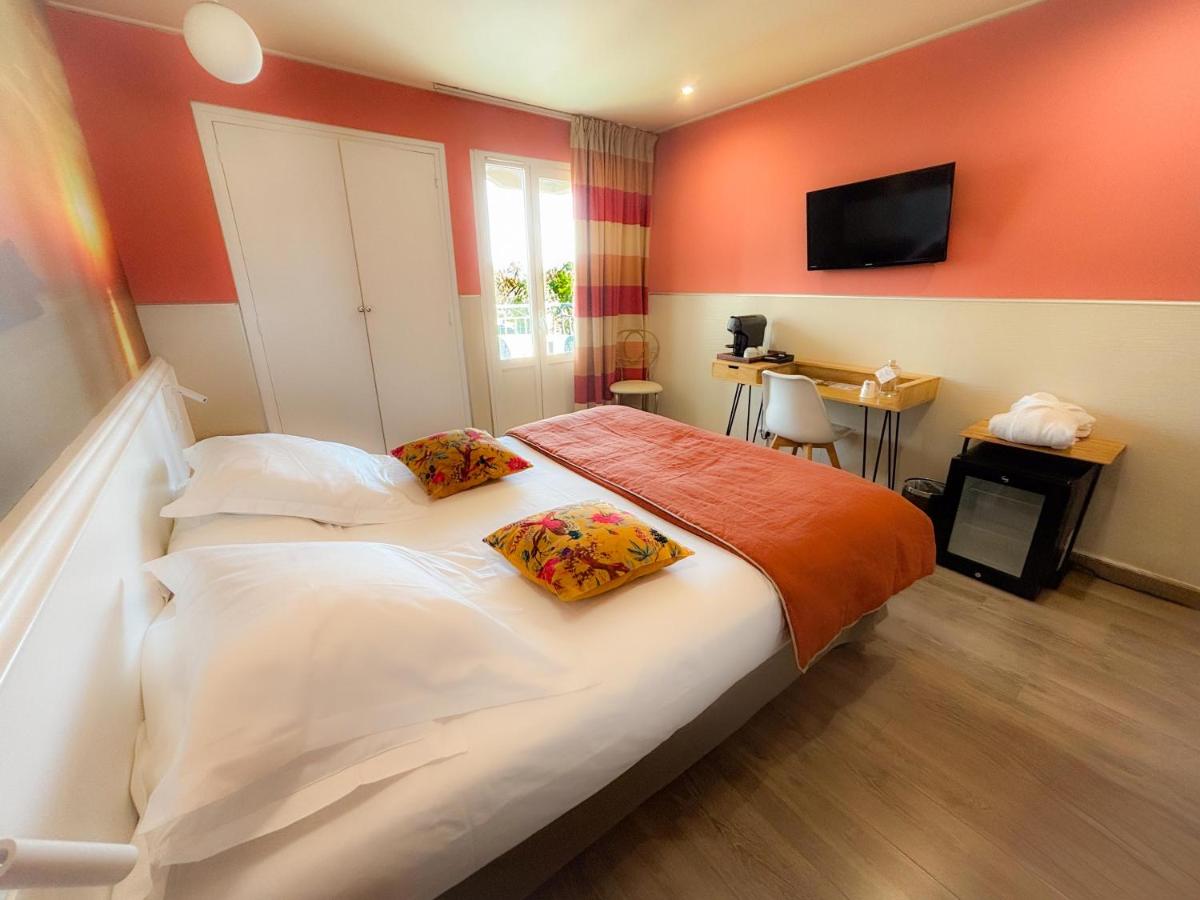 Un ou plusieurs lits dans un hébergement de l'établissement Ostella Spa & Resort
