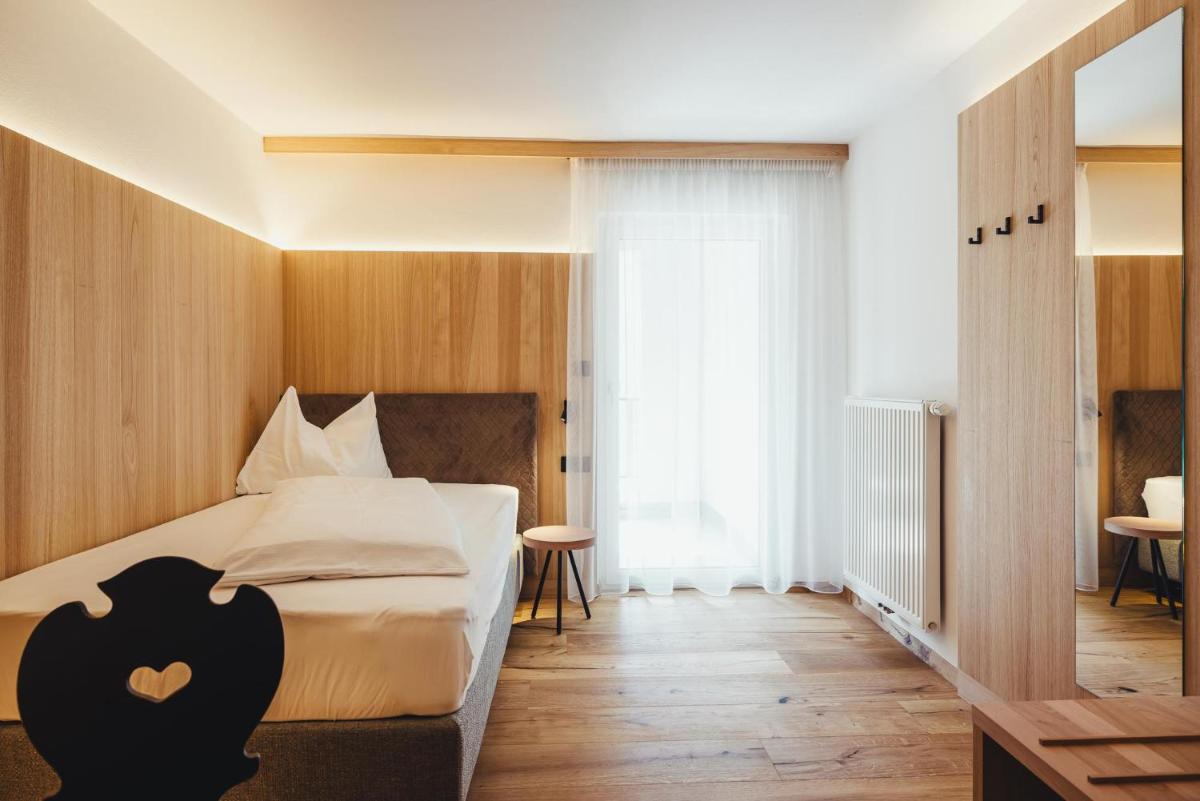 Weingut & Genusshotel Spitalerhof Superior - Housity
