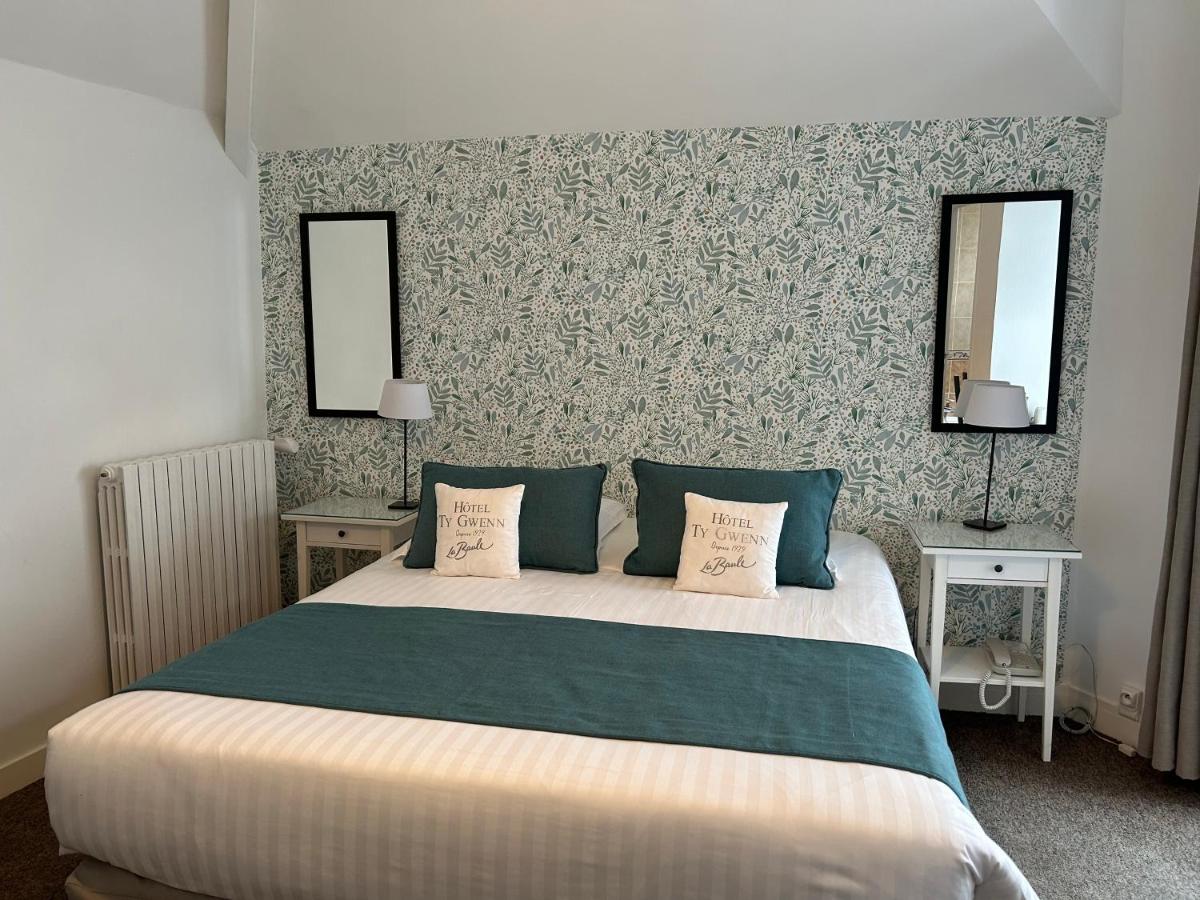Un ou plusieurs lits dans un hébergement de l'établissement Hotel Ty Gwenn La Baule