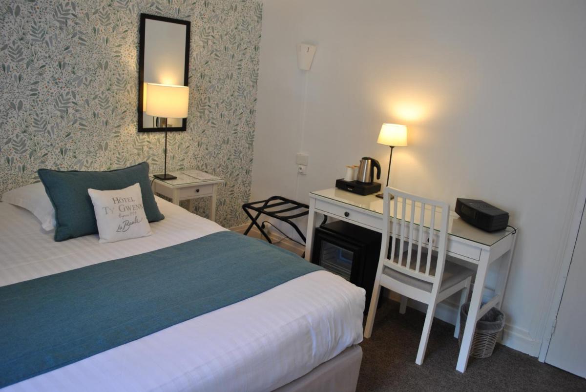 Un ou plusieurs lits dans un hébergement de l'établissement Hotel Ty Gwenn La Baule