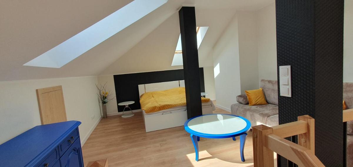 Apartamenty w Sercu Sosnówki - Housity