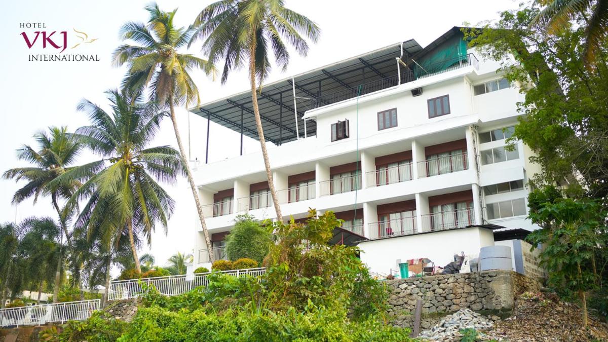 Hotel VKJ International Kuttampuzha - Housity