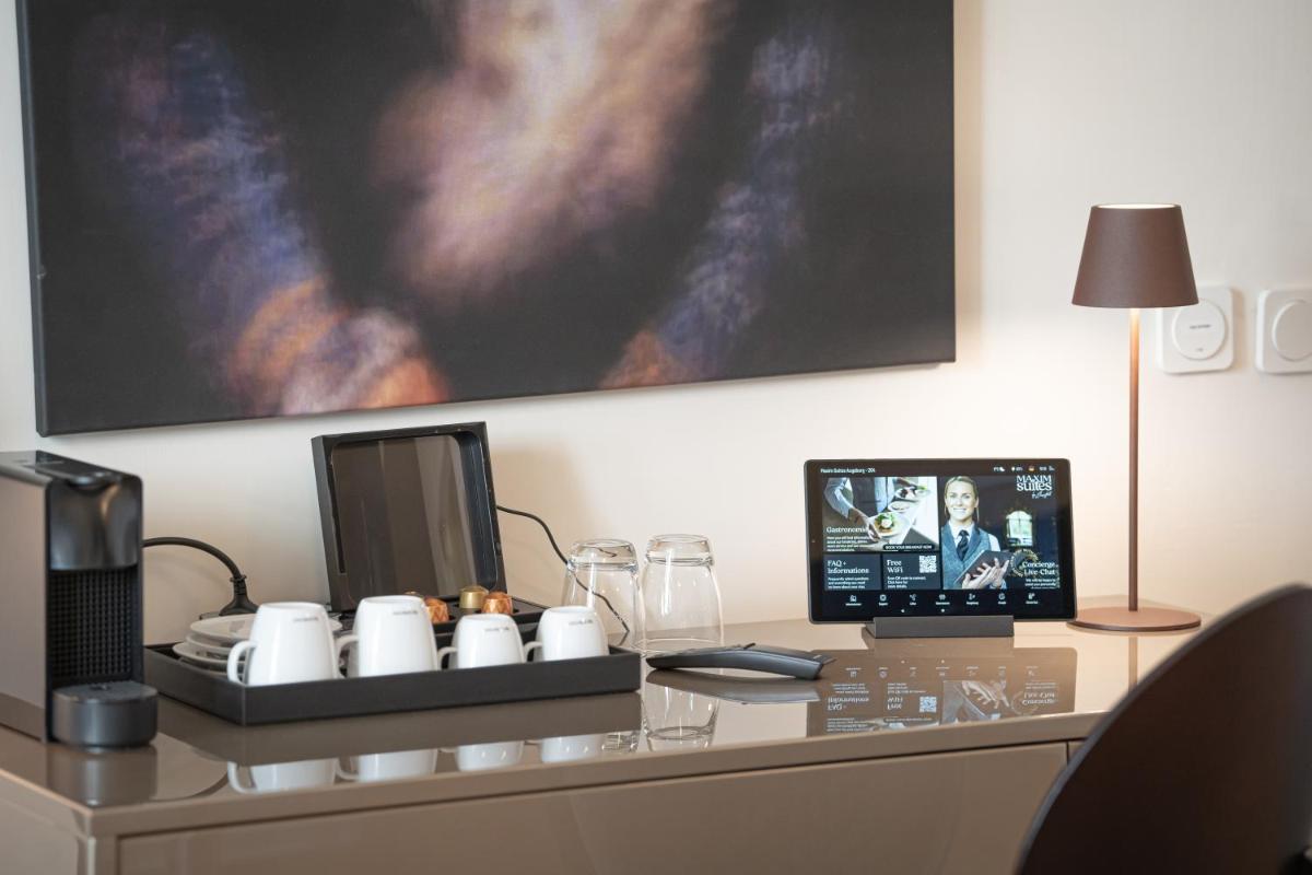 TV/Unterhaltungsangebot in der Unterkunft Maxim Suites by Elias Holl