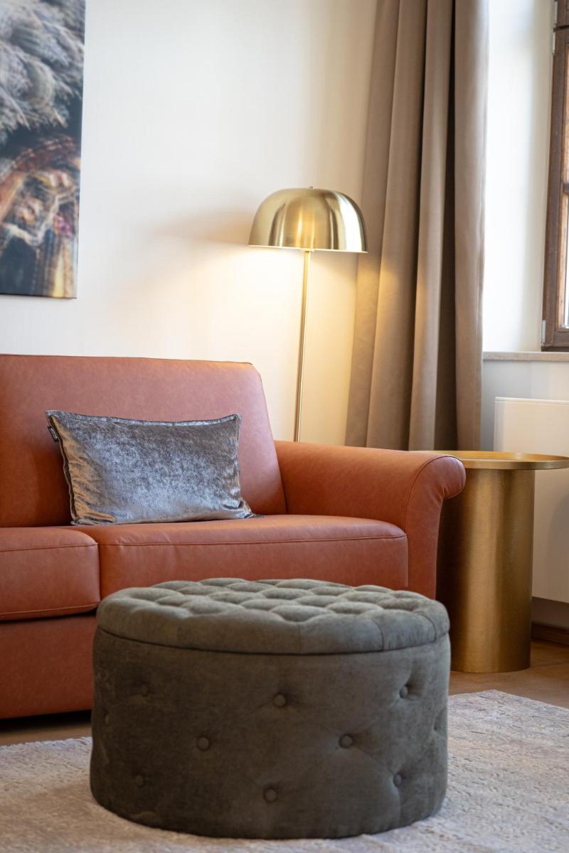Ein Sitzbereich in der Unterkunft Maxim Suites by Elias Holl
