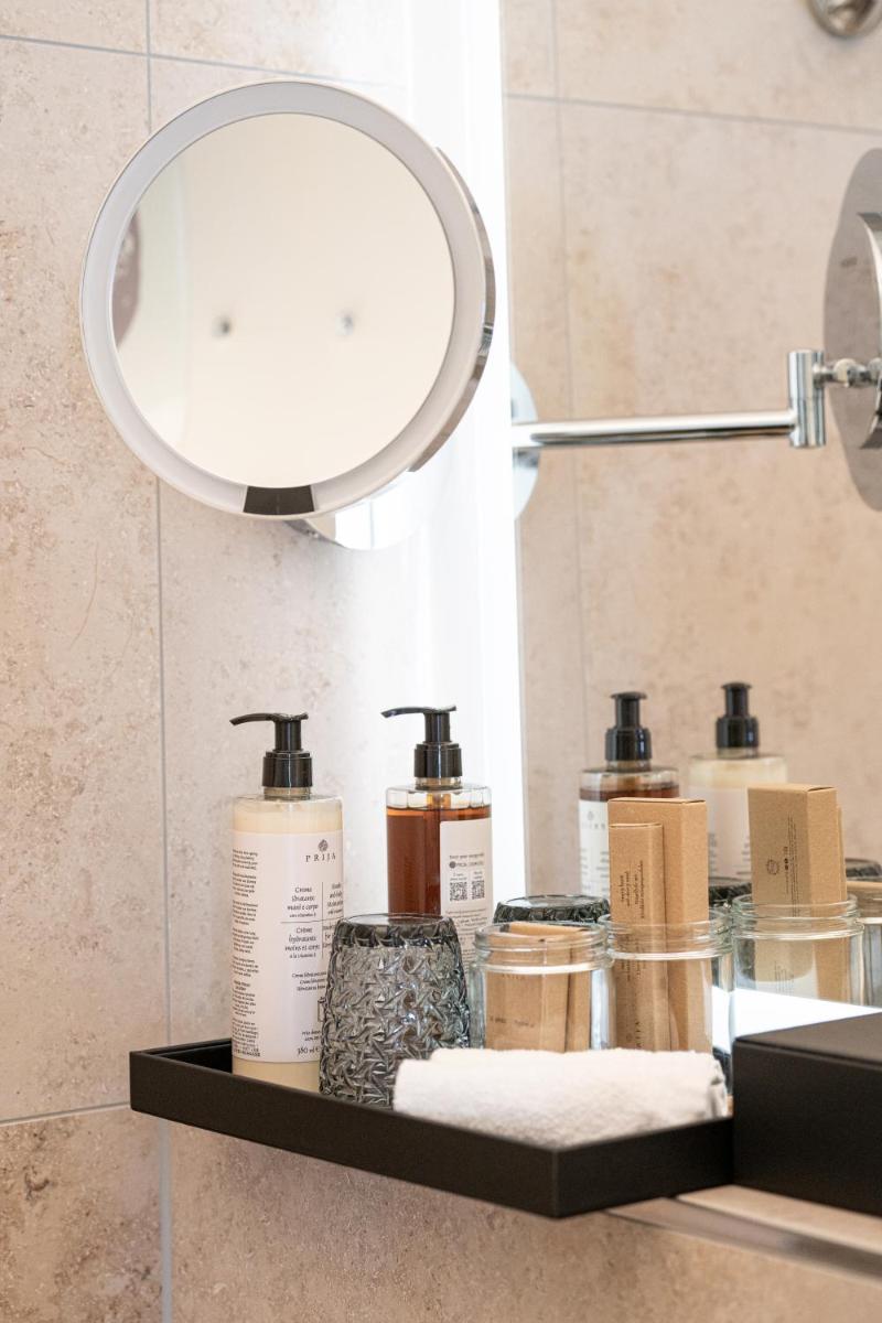 Ein Badezimmer in der Unterkunft Maxim Suites by Elias Holl