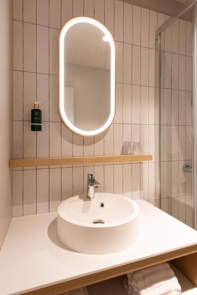 Salle de bains dans l'établissement La Maison OBONO Hôtel & Spa