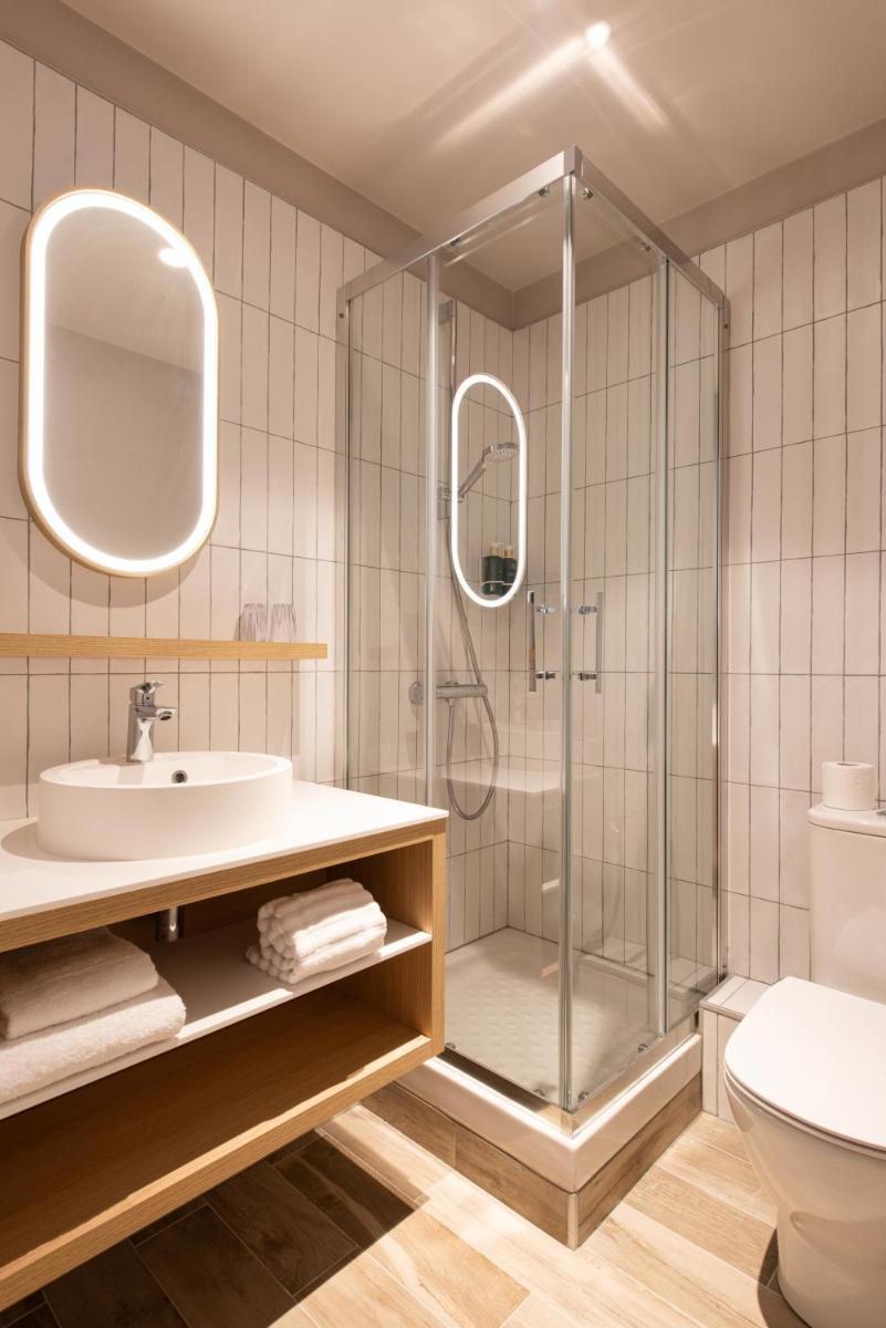 Salle de bains dans l'établissement La Maison OBONO Hôtel & Spa