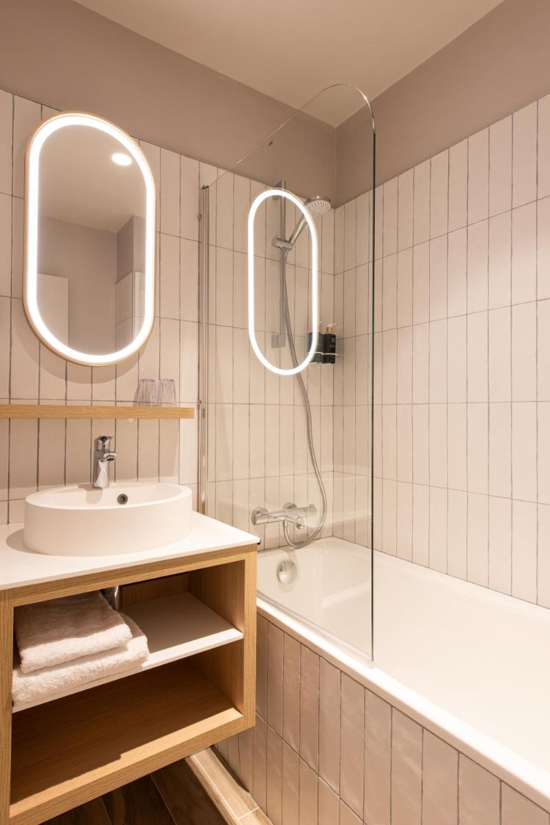 Salle de bains dans l'établissement La Maison OBONO Hôtel & Spa