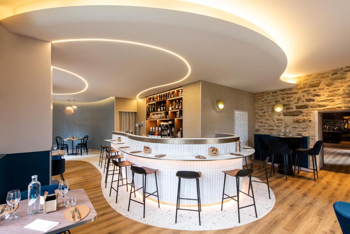 Coin salon dans l'établissement La Maison OBONO Hôtel & Spa