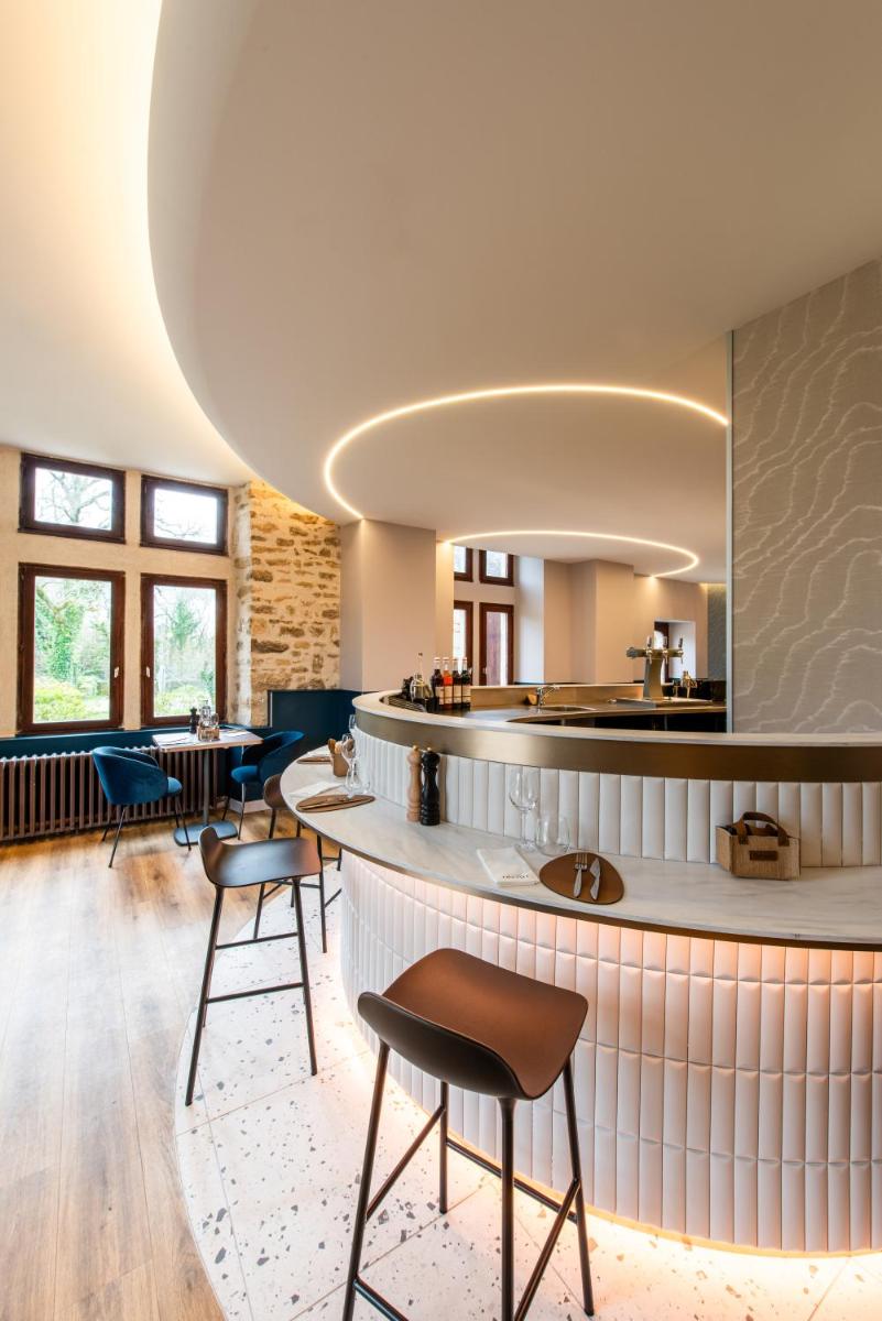 Coin salon dans l'établissement La Maison OBONO Hôtel & Spa
