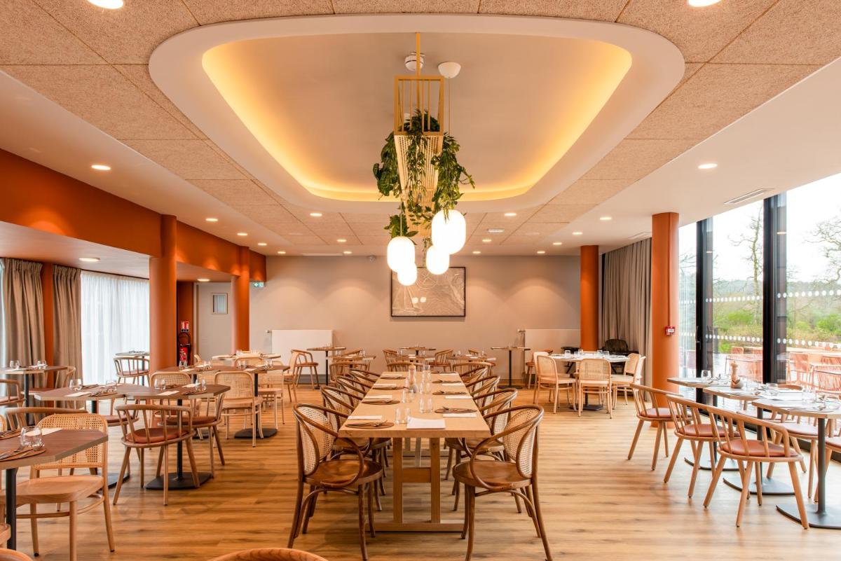 Restaurant ou autre lieu de restauration dans l'établissement La Maison OBONO Hôtel & Spa