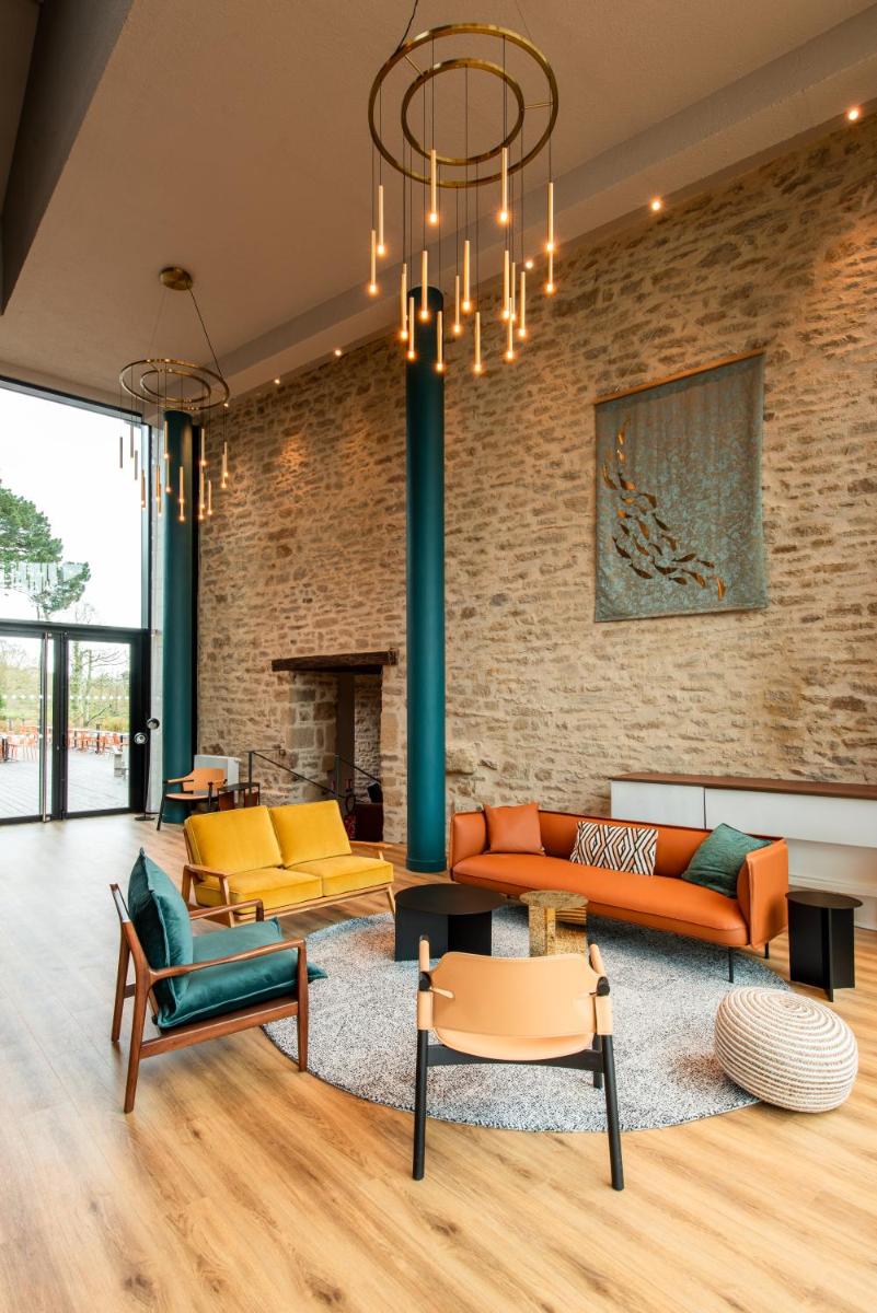 Coin salon dans l'établissement La Maison OBONO Hôtel & Spa