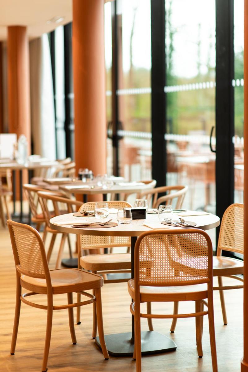 Restaurant ou autre lieu de restauration dans l'établissement La Maison OBONO Hôtel & Spa