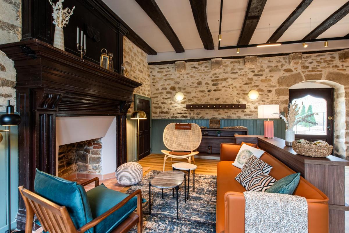 Coin salon dans l'établissement La Maison OBONO Hôtel & Spa