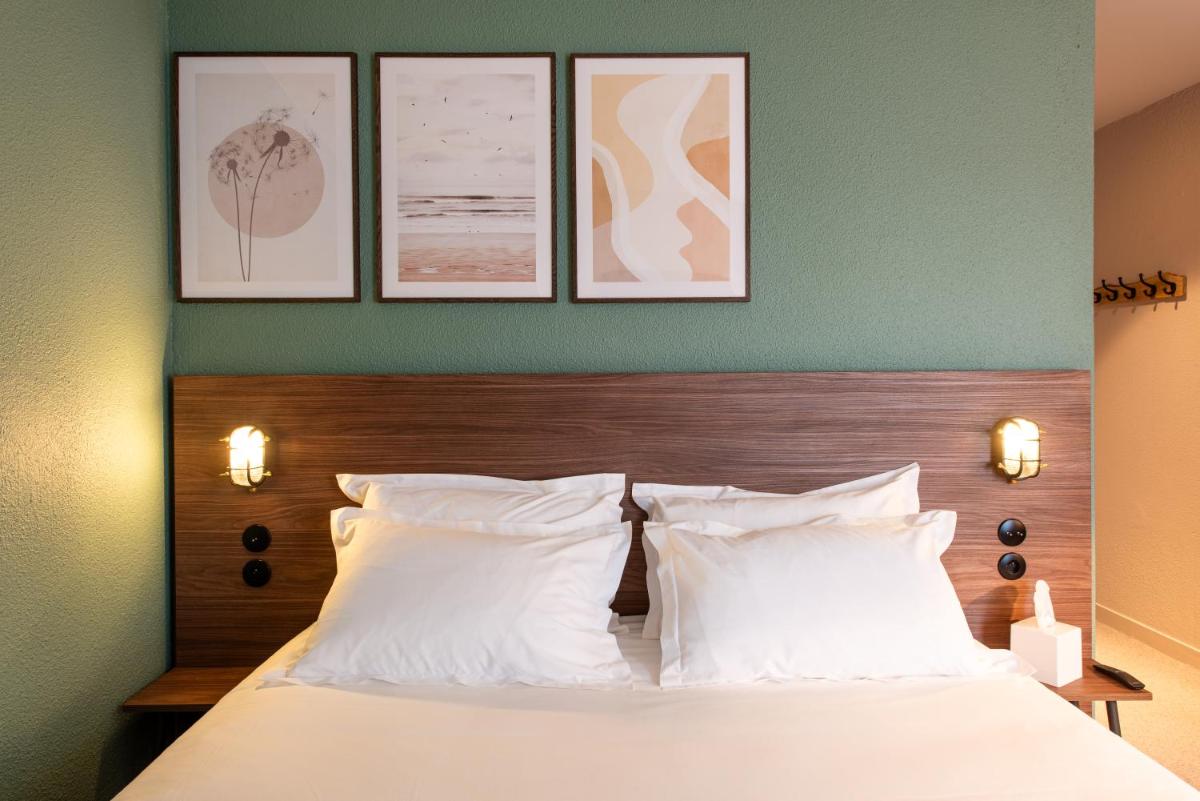 Un ou plusieurs lits dans un hébergement de l'établissement La Maison OBONO Hôtel & Spa