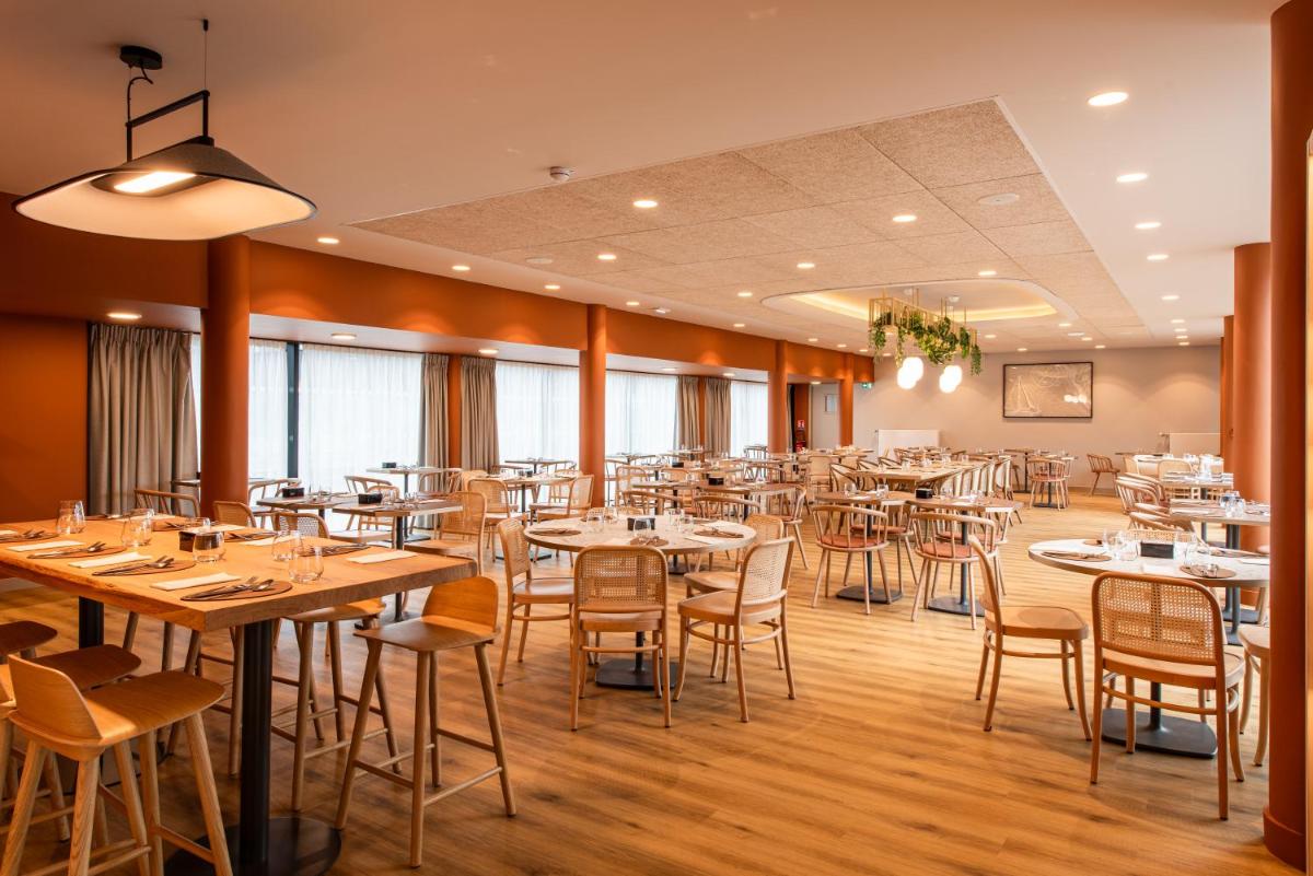 Restaurant ou autre lieu de restauration dans l'établissement La Maison OBONO Hôtel & Spa
