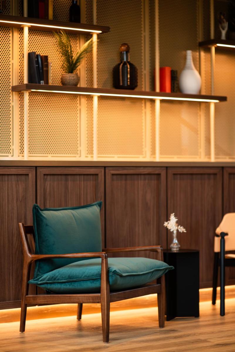 Coin salon dans l'établissement La Maison OBONO Hôtel & Spa