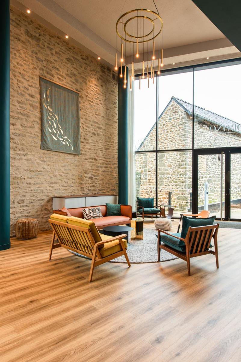 Coin salon dans l'établissement La Maison OBONO Hôtel & Spa