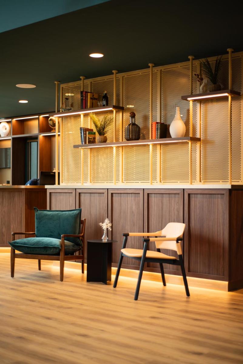 Coin salon dans l'établissement La Maison OBONO Hôtel & Spa