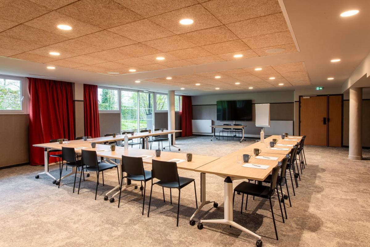 Espace de conférence ou salle de réunion dans l'établissement La Maison OBONO Hôtel & Spa