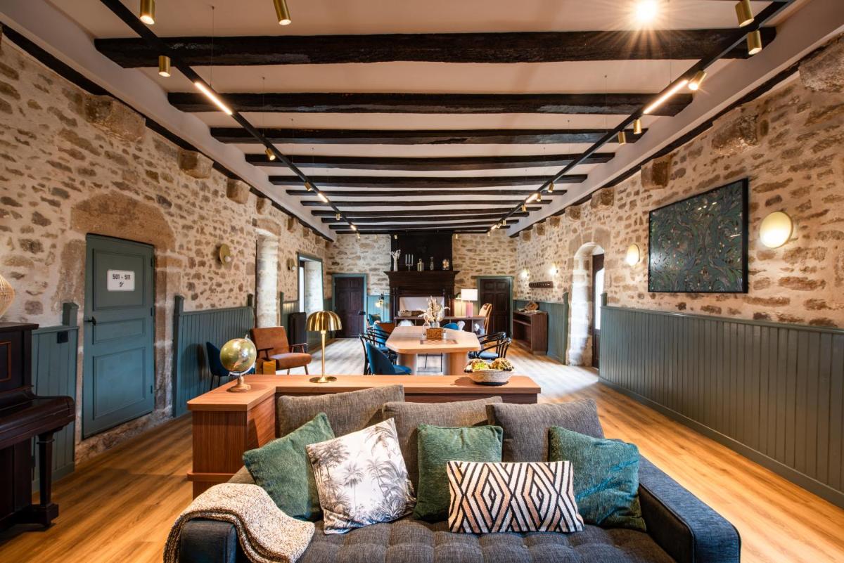 Coin salon dans l'établissement La Maison OBONO Hôtel & Spa