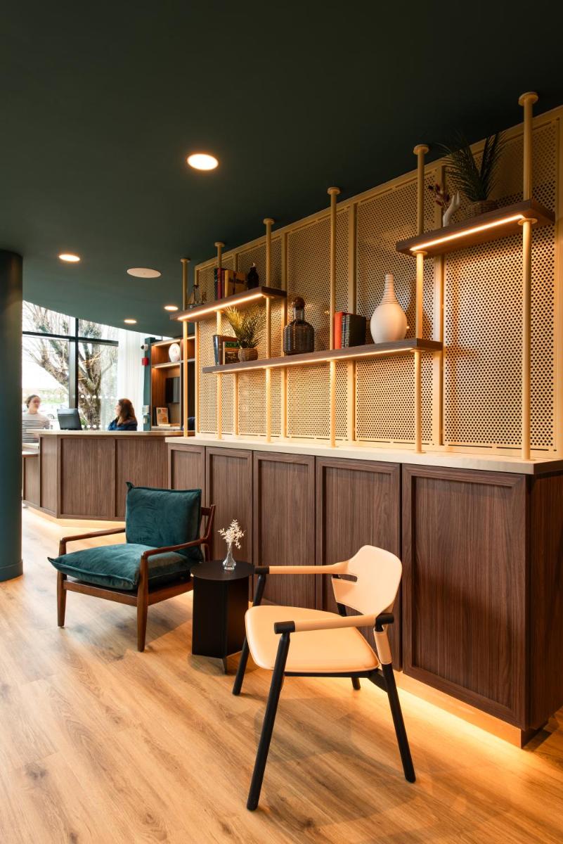 Coin salon dans l'établissement La Maison OBONO Hôtel & Spa