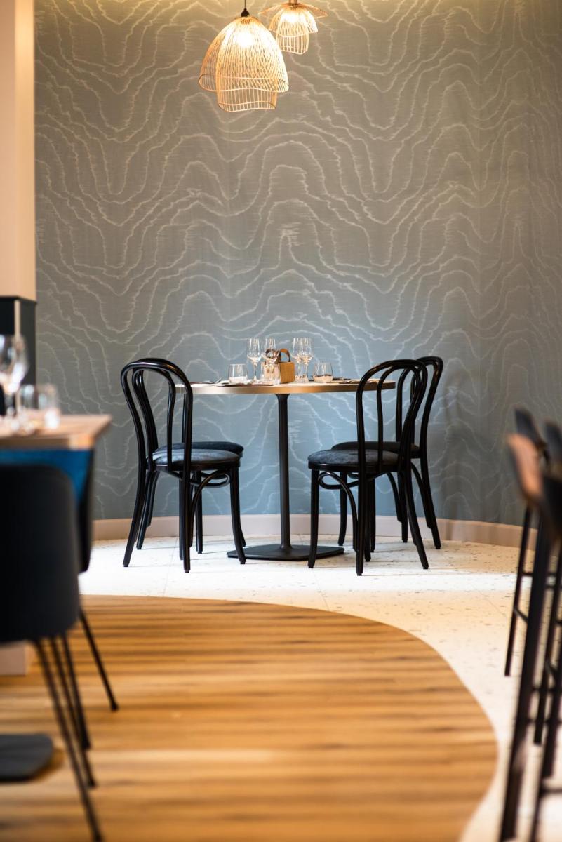 Coin salon dans l'établissement La Maison OBONO Hôtel & Spa