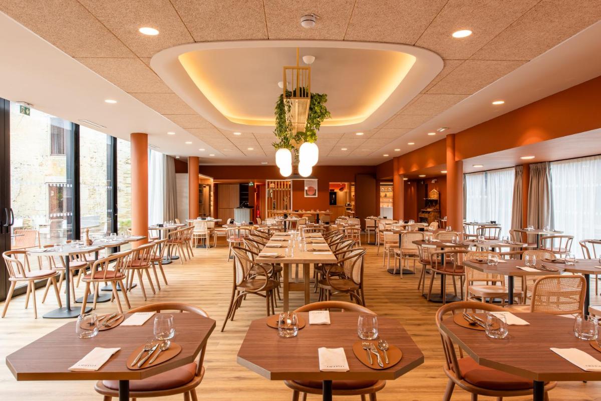 Restaurant ou autre lieu de restauration dans l'établissement La Maison OBONO Hôtel & Spa