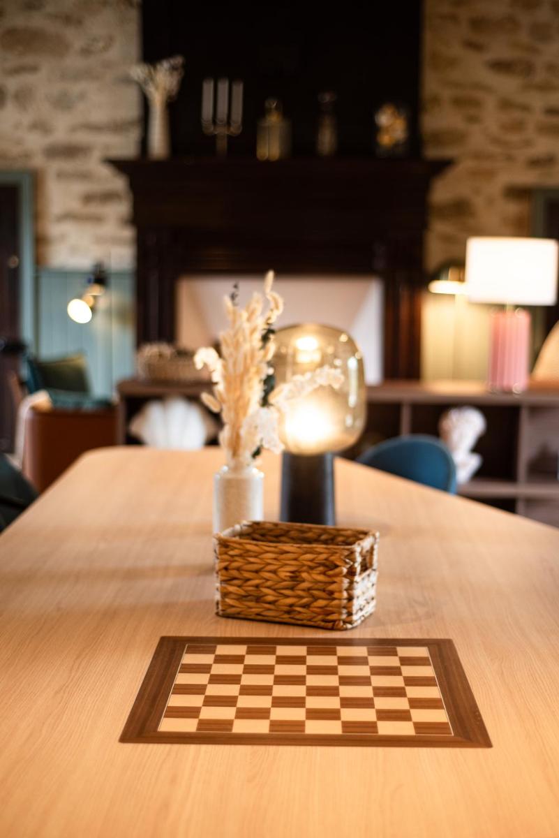 Coin salon dans l'établissement La Maison OBONO Hôtel & Spa