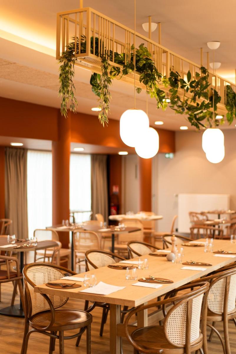Restaurant ou autre lieu de restauration dans l'établissement La Maison OBONO Hôtel & Spa