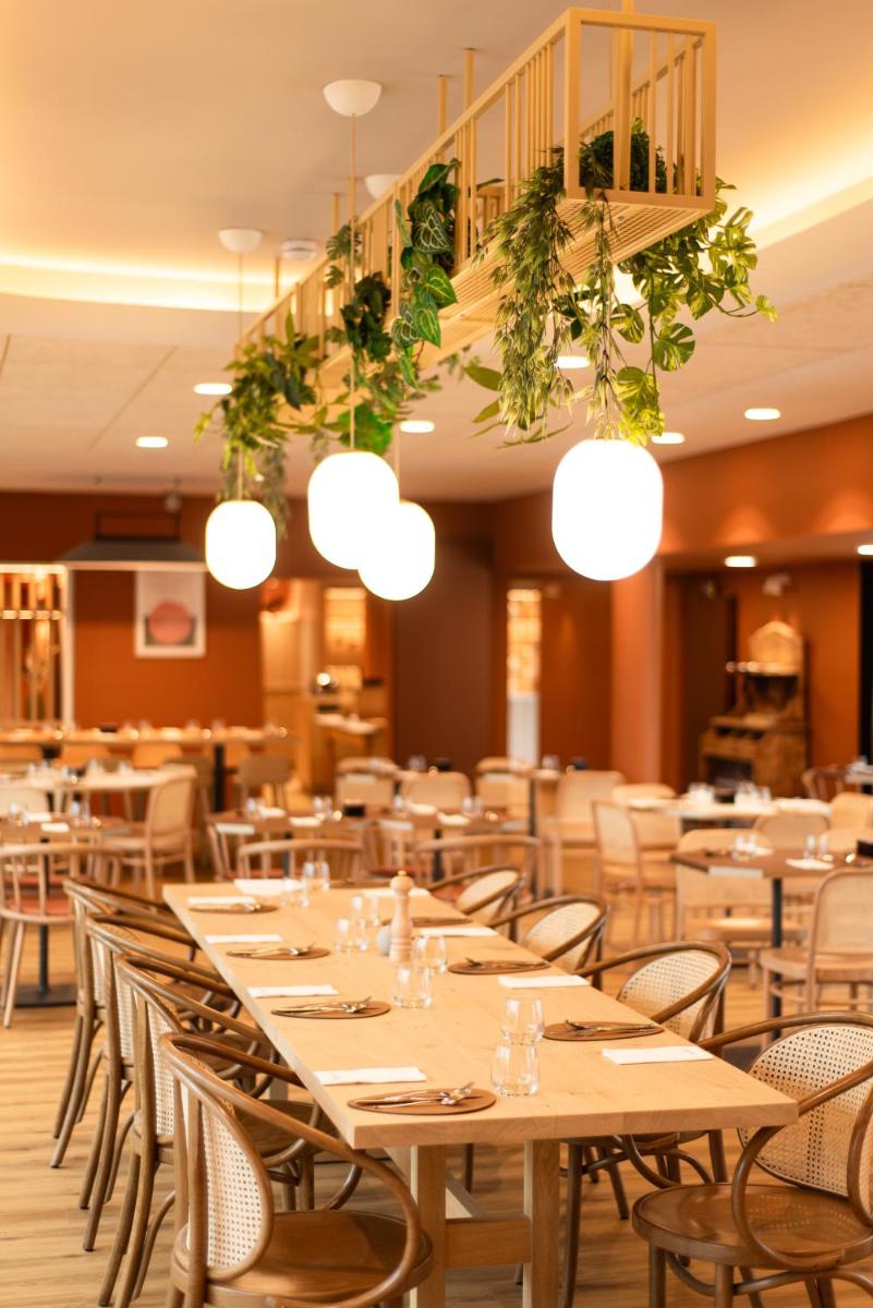 Restaurant ou autre lieu de restauration dans l'établissement La Maison OBONO Hôtel & Spa