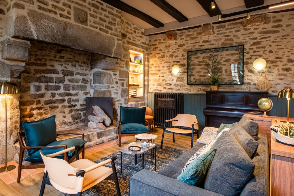 Coin salon dans l'établissement La Maison OBONO Hôtel & Spa