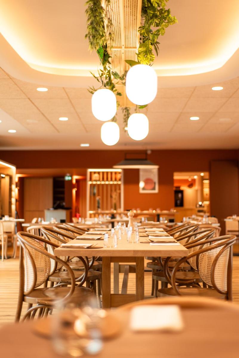 Restaurant ou autre lieu de restauration dans l'établissement La Maison OBONO Hôtel & Spa