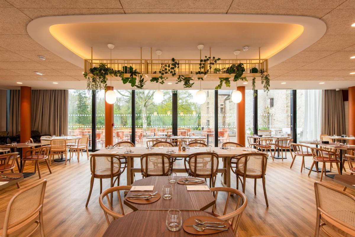 Restaurant ou autre lieu de restauration dans l'établissement La Maison OBONO Hôtel & Spa