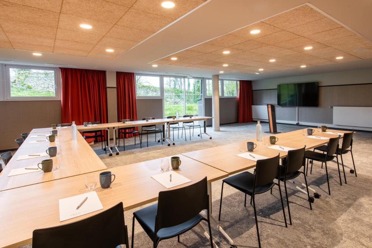 Espace de conférence ou salle de réunion dans l'établissement La Maison OBONO Hôtel & Spa