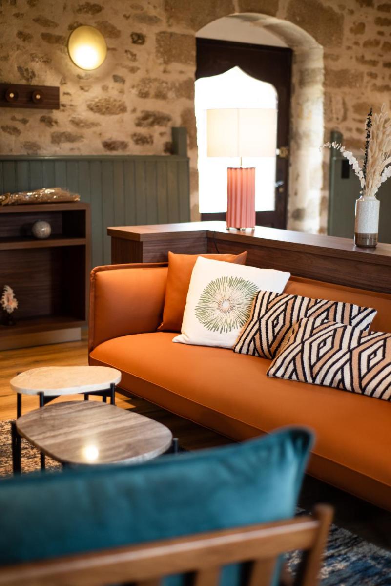 Coin salon dans l'établissement La Maison OBONO Hôtel & Spa