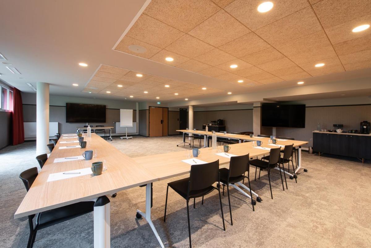 Espace de conférence ou salle de réunion dans l'établissement La Maison OBONO Hôtel & Spa