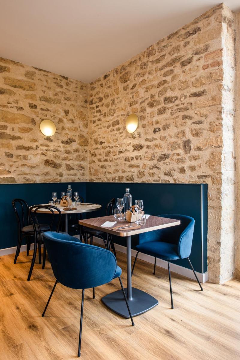 Coin salon dans l'établissement La Maison OBONO Hôtel & Spa