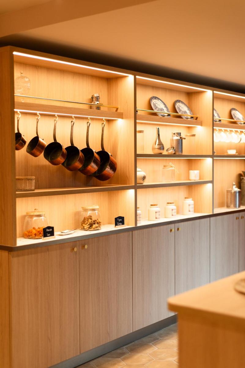 Cuisine ou kitchenette dans l'établissement La Maison OBONO Hôtel & Spa