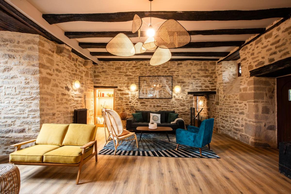 Coin salon dans l'établissement La Maison OBONO Hôtel & Spa