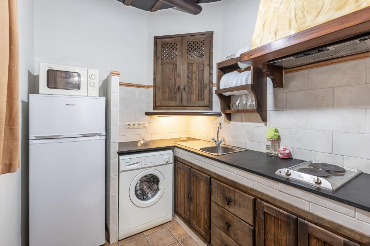 Una cocina o zona de cocina en Turismo Rural & SPA El Cercado