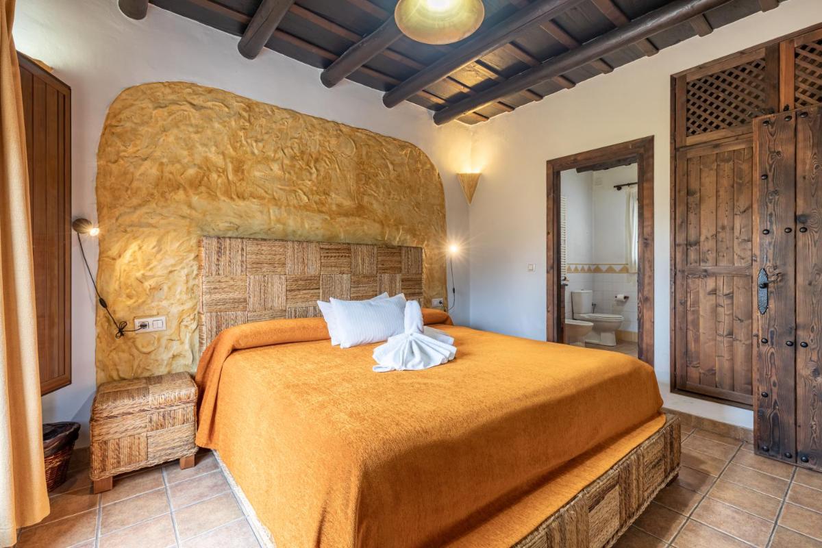 Cama o camas de una habitación en Turismo Rural & SPA El Cercado