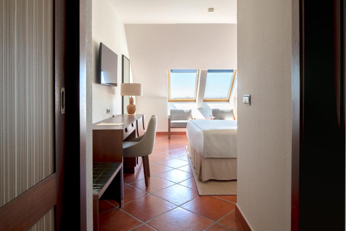 Cama o camas de una habitación en Puerto Antilla Grand Hotel