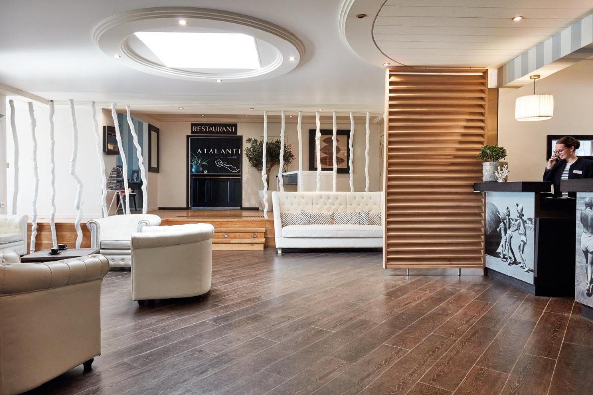 Coin salon dans l'établissement Hôtel Atalante - Relais Thalasso & Spa
